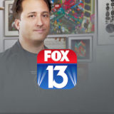man smiling with the fox 13 icon in front