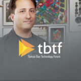 Man smiling with tbtf text in front