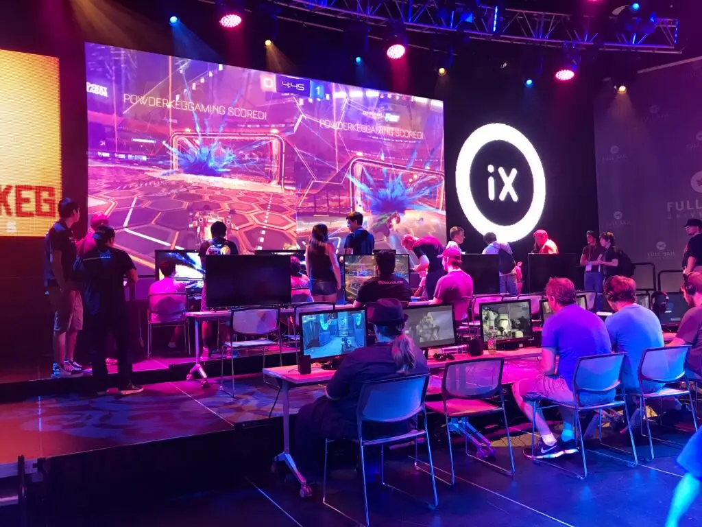 People playing video games while it is being streamed on the big screen