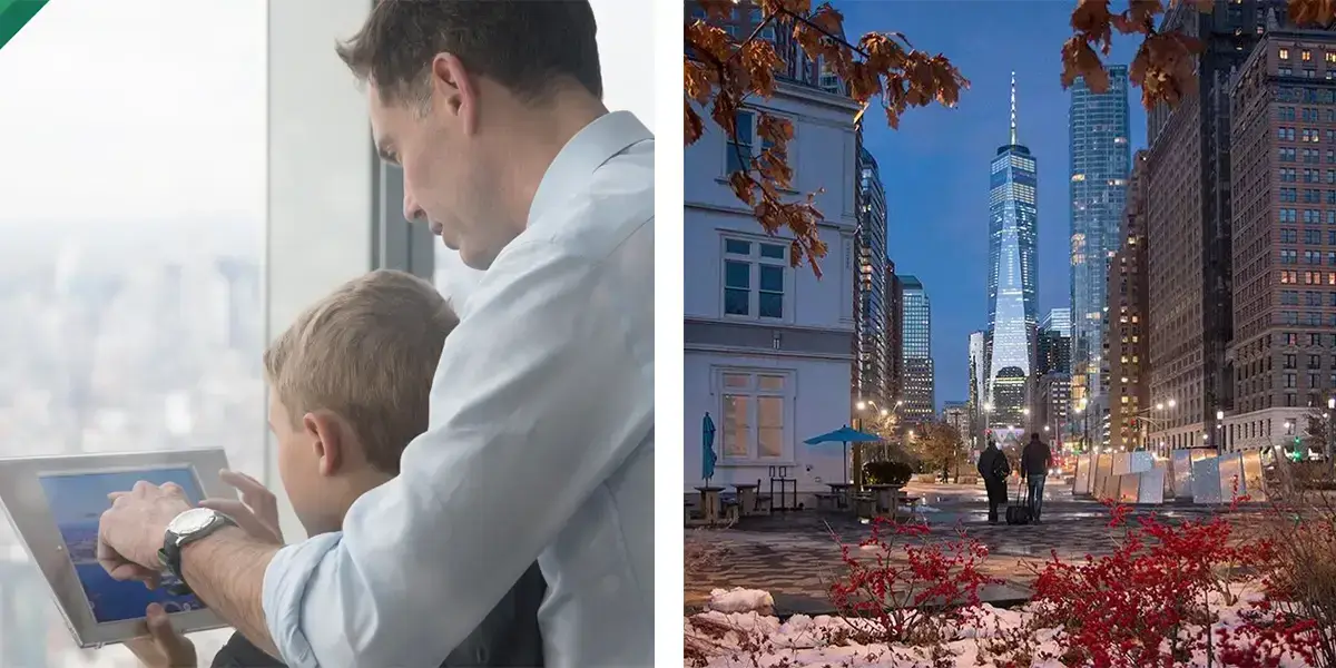 Dad helping child on tablet and city lights