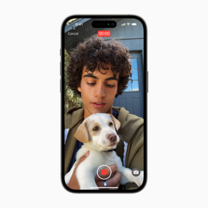 iphone screen with young boy and puppy